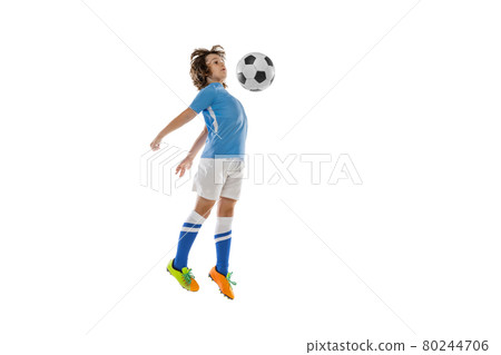 Portrait of little male football soccer player, boy training with football ball isolated on white studio background. Concept of sport, game, hobby Portrait of little male football soccer player, boy training with football ball isolated on white studio background. Concept of sport, game, hobby 80244706