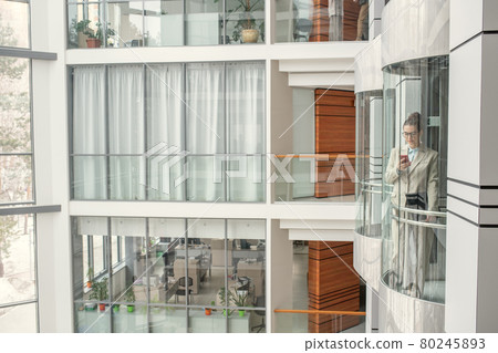 Modern office building with elevator 80245893