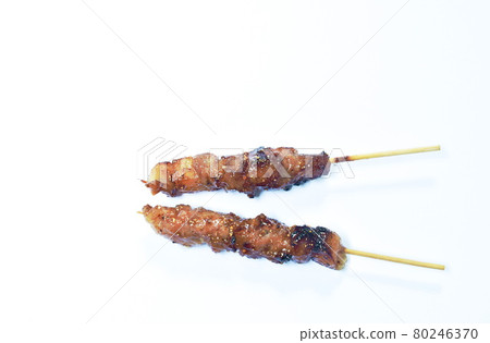 grilled pork dressings spicy sauce stabbing in wooden stick on white background grilled pork dressings spicy sauce stabbing in wooden stick on white background 80246370