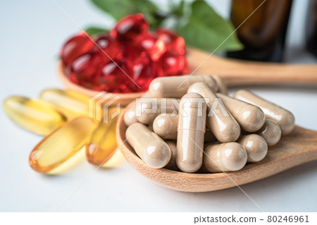 Alternative medicine herbal organic capsule with vitamin E omega 3 fish oil, mineral, drug with herbs leaf natural supplements for healthy good life. Alternative medicine herbal organic capsule with vitamin E omega 3 fish oil, mineral, drug with herbs leaf natural supplements for healthy good life. 80246961