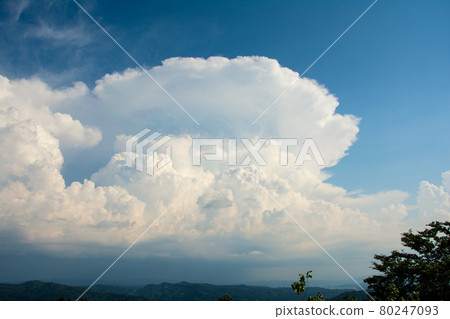 Cumulonimbus clouds and anvil clouds in summer Cumulonimbus clouds and anvil clouds in summer 80247093