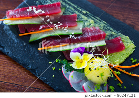 Raw tuna with cucumber and guacamole Raw tuna with cucumber and guacamole 80247121