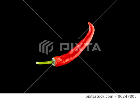 Pepper chili. Red hot chili paprika or spicy chile cayenne pepper isolated on black background. Ingredient for fresh spice mexican food. 80247803