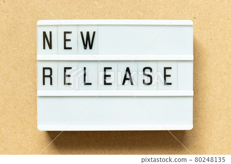 Lightbox with word new release on wood background 80248135