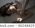 Portrait of a woman lying down 80248429