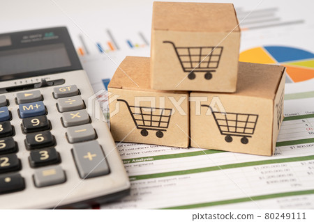 Shopping cart logo on box with calculator on graph background. Banking Account, Investment Analytic research data economy, trading, Business import export transportation online company concept. 80249111