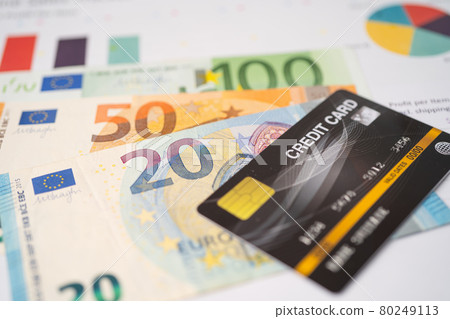 Credit card with Euro banknotes on chart and graph paper. Finance development, Banking Account, Statistics, Investment Analytic research data economy, Stock exchange trading, Business company concept. 80249113