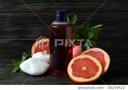 Natural shower gel and ingredients on wooden background Natural shower gel and ingredients on wooden background 80249422