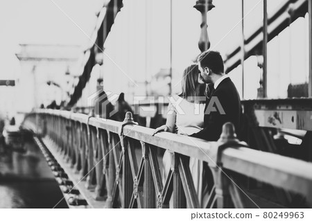 Young wedding couple, beautiful bride with groom portrait on the bridge, summer nature outdoor Young wedding couple, beautiful bride with groom portrait on the bridge, summer nature outdoor 80249963