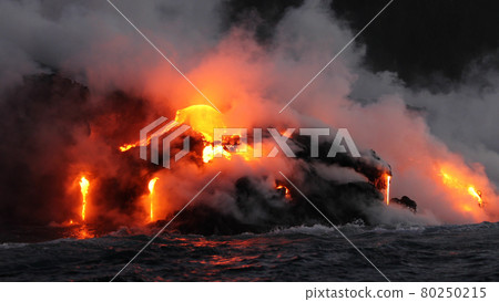 Lava running in the ocean from volcanic lava eruption on Big Island Hawaii. Seen from lava boat tour. Lava from Kilauea volcano by Hawaii volcanoes national park, USA 80250215