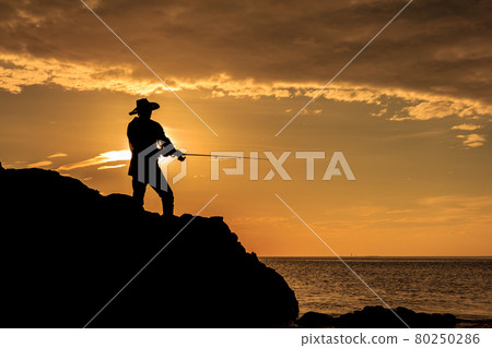 Silhouette of man fishing Silhouette of man fishing 80250286