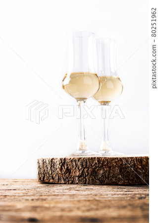 Italian golden grappa drink Italian golden grappa drink 80251962