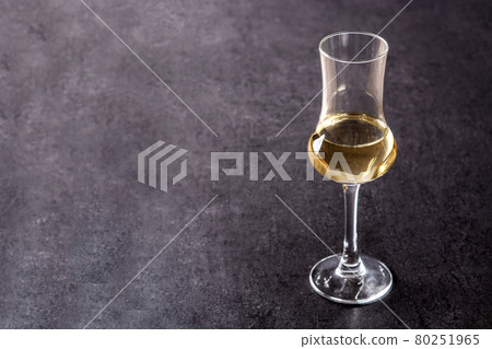 Italian golden grappa drink Italian golden grappa drink 80251965