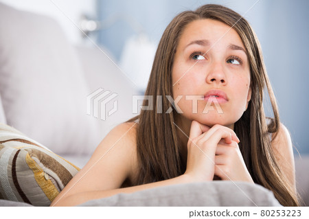 Teenage girl is feeling sad and lonely 80253223