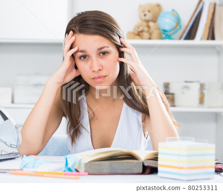 School girl is solving an equation 80253311