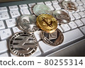 Bitcoin cryptocurrency coin on the background of the keyboard 80255314