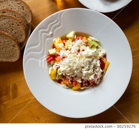 Shopska salad - dish of Balkan cuisine. Shopska salad - dish of Balkan cuisine. 80259276