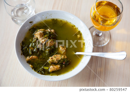 Chakapuli lamb is Georgian dish closeup 80259547