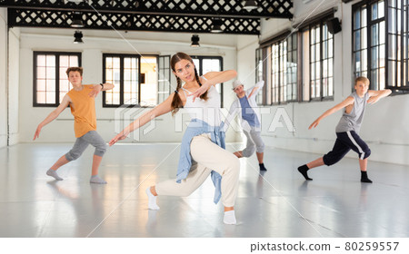 Girl training hip hop at group class 80259557