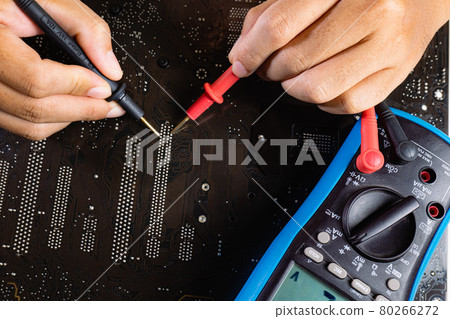 Check the computer motherboard's circuit pattern with a multimeter. 80266272
