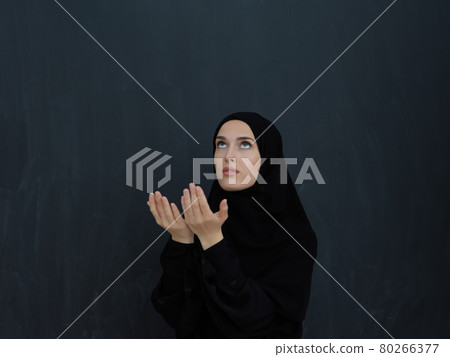Portrait of young Muslim woman making dua Portrait of young Muslim woman making dua 80266377