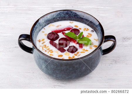 rice porridge with berries, served with mint rice porridge with berries, served with mint 80266872