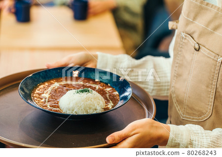 Hall staff carrying curry rice Hall staff carrying curry rice 80268243