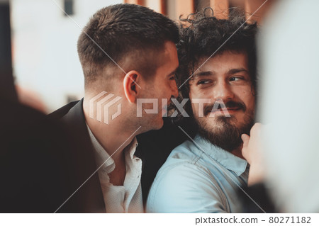 Diverse friends gay couple hugging. Stylish cool generation z men dating in love enjoy romantic relationships 80271182