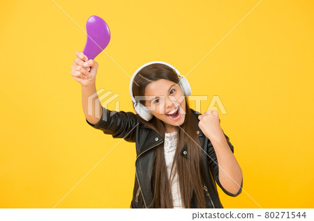 Dance to the rhythm. hipster urban style girl. kid in headset.  80271544