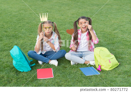 funny and happy sisters with party attributes. writing funny and happy sisters with party attributes. writing 80271772