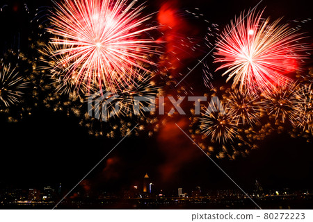 A night sky full of brilliant fireworks 80272223