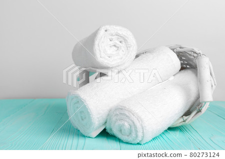 Clean soft towels on wooden table Clean soft towels on wooden table 80273124