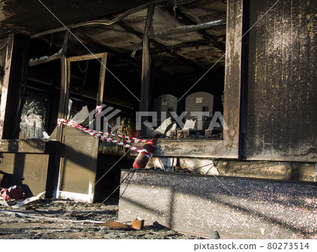 devastation after a fire in a public place 80273514