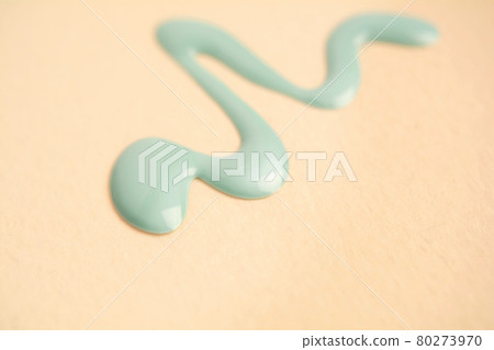 Blue glossy nail polish on a light background 80273970