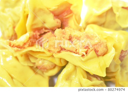 frozen food raw Chinese dumpling stuffed mashed shrimp and pork or dim sum on white background  80274974