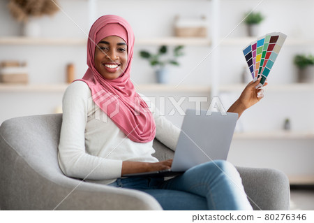 Muslim Women Jobs. Black Islamic Designer Lady With Laptop And Color Swatches 80276346