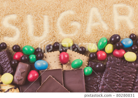 A lot of sweets with inscription sugar. Reduction eating unhealthy food 80280831