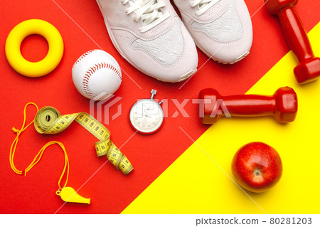 Fitness Gym equipment on color background Fitness Gym equipment on color background 80281203