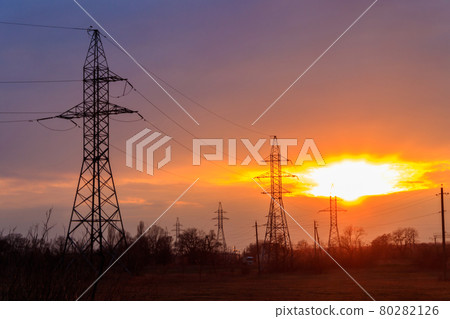 High voltage power line at sunset 80282126