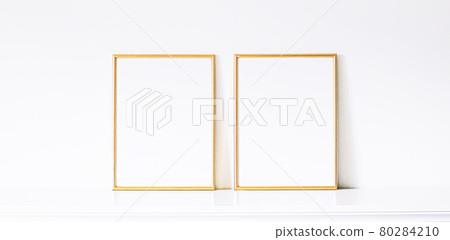 Golden frame on white furniture, luxury home decor and design for mockup, poster print and printable art, online shop showcase 80284210