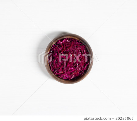Homemade sauerkraut. Fermented food. Sauerkraut with carrots and beets in a wooden bowl on a white background. Homemade sauerkraut. Fermented food. Sauerkraut with carrots and beets in a wooden bowl on a white background. 80285065