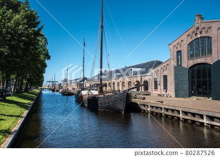 Old sailing boats in the harbor of Den Helder, the Netherlands. 80287526