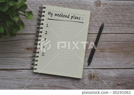 Text on notepad on wooden table Text on notepad on wooden table 80291062