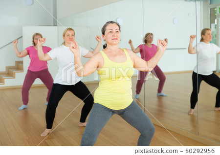 Three women are dancing 80292956