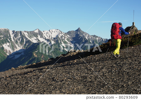 Climbers going while looking at Mt. Yari 80293609