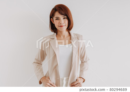 Office woman in white clothes and creamy casual suit on white background. Office woman in white clothes and creamy casual suit on white background. 80294689