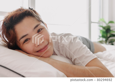 Close up of happy woman just wake up in warm morning of summer. Close up of happy woman just wake up in warm morning of summer. 80294692