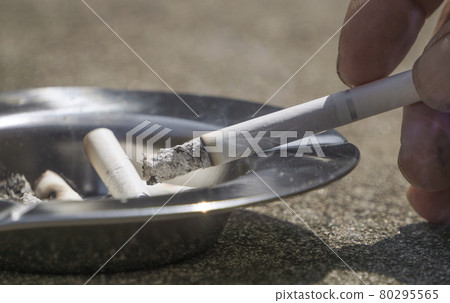 Tobacco and ashtray outdoor photography Tobacco and ashtray outdoor photography 80295565