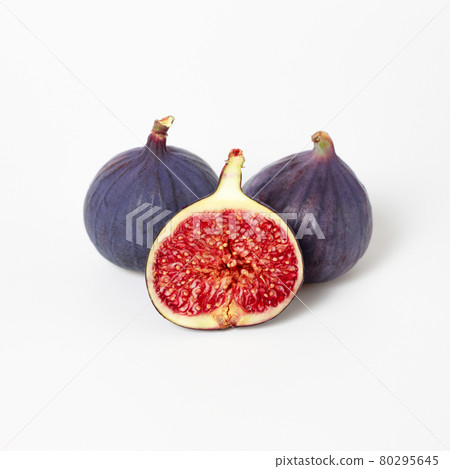Fresh figs isolated on white background. Food Photo. Purple Fig with red seeds close up. Side view. 80295645