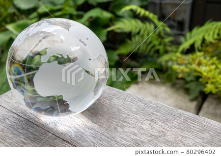 Glass globe and green SDGs environmental protection image 80296402